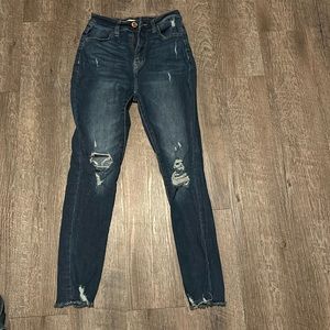 Dark blue distressed jeggings
